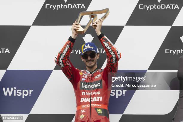 Francesco Bagnaia of Italy and Ducati Lenovo Team celebrates the victory on the podium during the MotoGP race during the MotoGP of Austria - Race at...