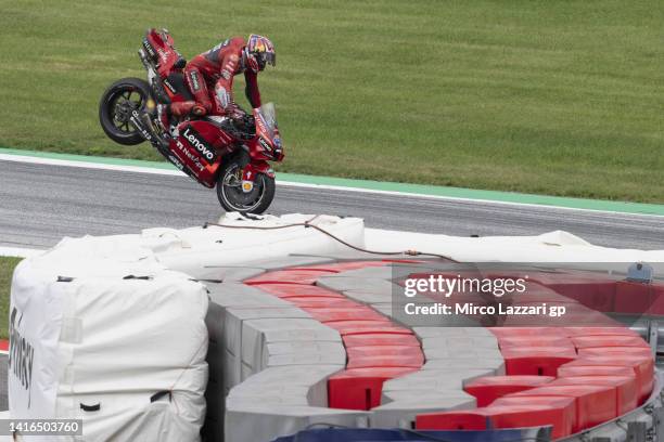 Jack Miller of Australia and Ducati Lenovo Team celebrates the third place and lifts the rear wheel during the MotoGP race during the MotoGP of...