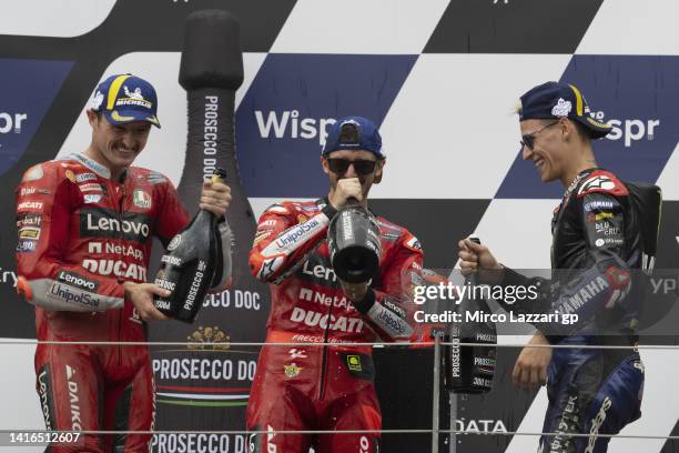 Jack Miller of Australia and Ducati Lenovo Team, Francesco Bagnaia of Italy and Ducati Lenovo Team and Fabio Quartararo of France and Monster Energy...