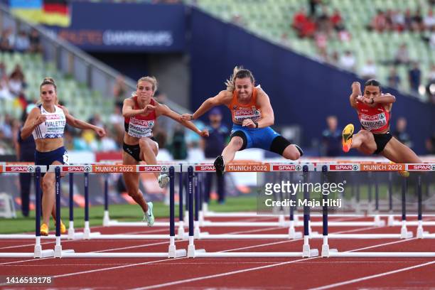 Mette Graversgaard of Denmark, Nadine Visser of Netherlands and Ditaji Kambundji of Switzerland compete during the Athletics - Women's 100m Hurdles...