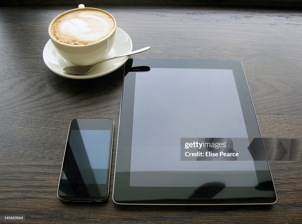 Coffee, smartphone and tablet