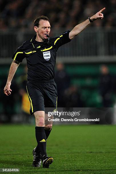 Referee Florian Meyer reacts during the DFB Cup semi final match between SpVgg Greuther Fuerth and Borussia Dortmund at Trolli-Arena on March 20,...