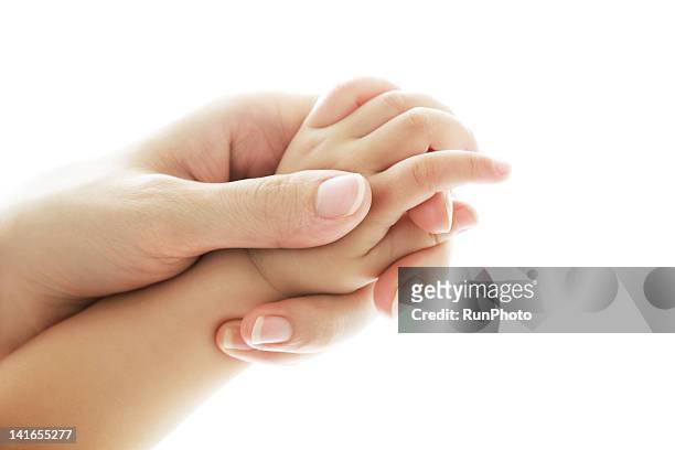 mother and baby's hand - baby hands ストックフォトと画像