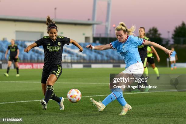 Lauren Hemp of Manchester City is challenged by Kenti Robles of Real Madrid during the UEFA Women's Champions League match between Manchester City...