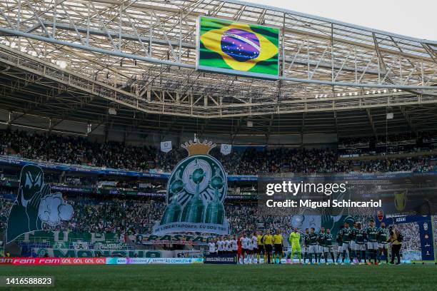 Players listening the National Anthem before a match between Palmeiras and Flamengo as part of Brasileirao 2022 at Allianz Parque on August 21, 2022...