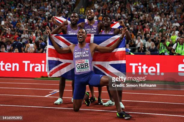 Zharnel Hughes, Jona Efoloko, Nethaneel Mitchell-Blake and Jeremiah Azu of Great Britain and Northern Ireland celebrate after the Athletics - Men's...