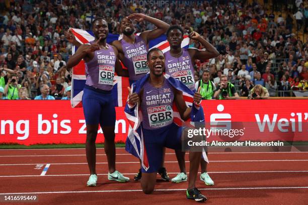 Zharnel Hughes, Jona Efoloko, Nethaneel Mitchell-Blake and Jeremiah Azu of Great Britain and Northern Ireland celebrate after the Athletics - Men's...