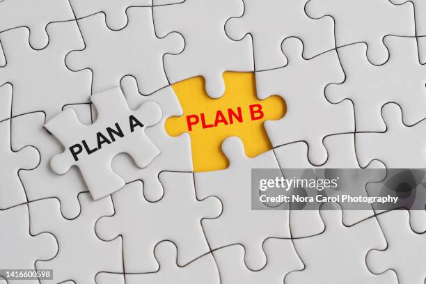 plan a and plan b text on jigsaw puzzle - plan a plan b stock pictures, royalty-free photos & images