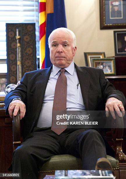 Senator John McCain waits during an interview by AFP on March 21, 2012 in his Russell Senate Office Building office on Capitol Hill in Washington,...