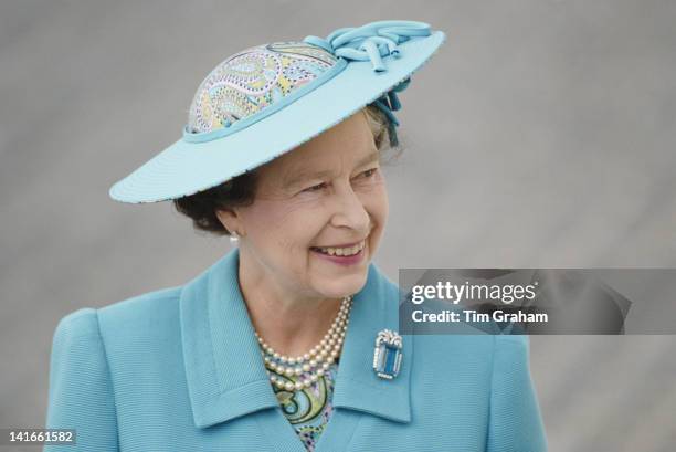 Queen Elizabeth II visits the Isle of Man, 8th August 1989. She is wearing a hat by Philip Somerville and an aquamarine brooch.