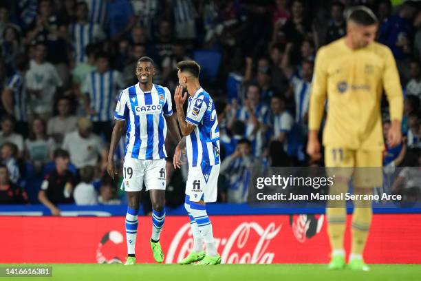 Alexander Isak of Real Sociedad celebrates after scoring their side's first goal during the LaLiga Santander match between Real Sociedad and FC...