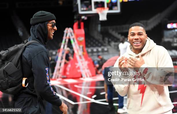 Personality Matt James and rapper Nelly attend the Monster Energy BIG3 Celebrity Basketball Game at State Farm Arena on August 21, 2022 in Atlanta,...