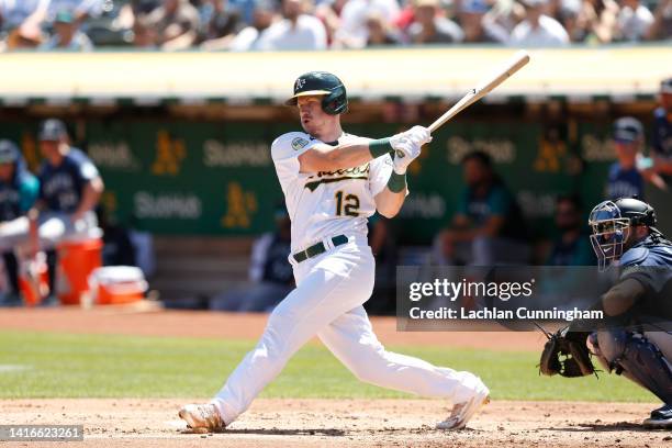 Sean Murphy of the Oakland Athletics hits an RBI double in the bottom of the first inning against the Seattle Mariners at RingCentral Coliseum on...