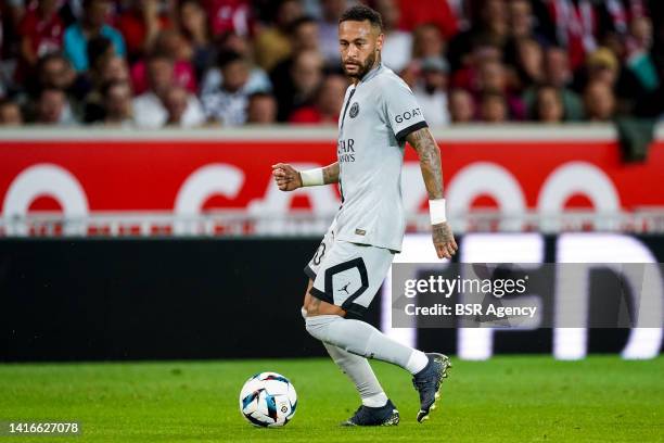 Neymar of Paris Saint-Germain dribbles with the ball during the Ligue 1 Uber Eats match between Lille OSC and Paris Saint-Germain at Stade...