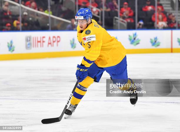 Anton Olsson of Sweden passes the puck during the game against Czechia in the IIHF World Junior Championship on August 20, 2022 at Rogers Place in...