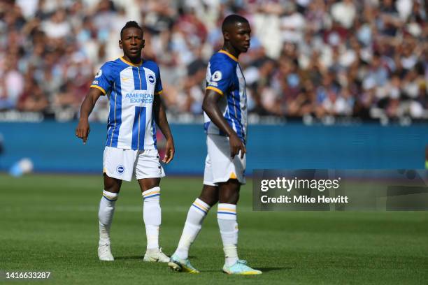 Ecuadorians Pervis Estupinan and Moises Caicedo of Brighton & Hove Albion look on during the Premier League match between West Ham United and...