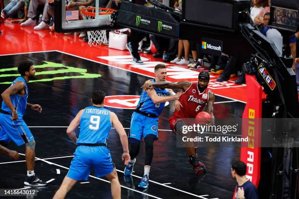 Earl Clark of the Trilogy is fouled by TJ Cline of the Power during the BIG3 Championship at State Farm Arena on August 21, 2022 in Atlanta, Georgia.