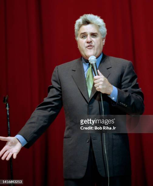Comedian Jay Leno performs on stage at the Shrine Auditorium, October 26, 1999 in Los Angeles, California.