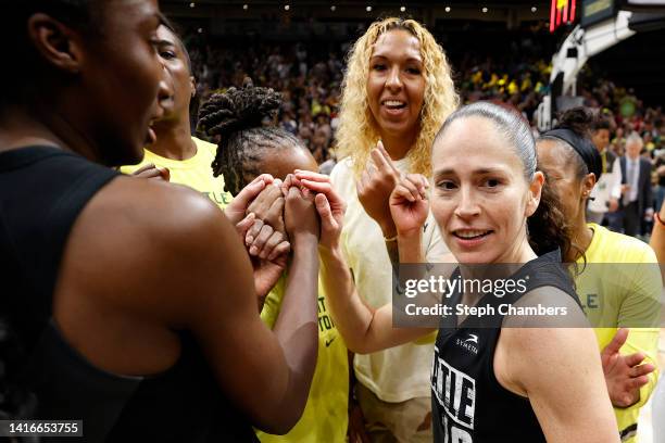 Sue Bird of the Seattle Storm gathers her team after beating Washington Mystics 97-84 during Round 1 Game 2 of the WNBA playoffs at Climate Pledge...