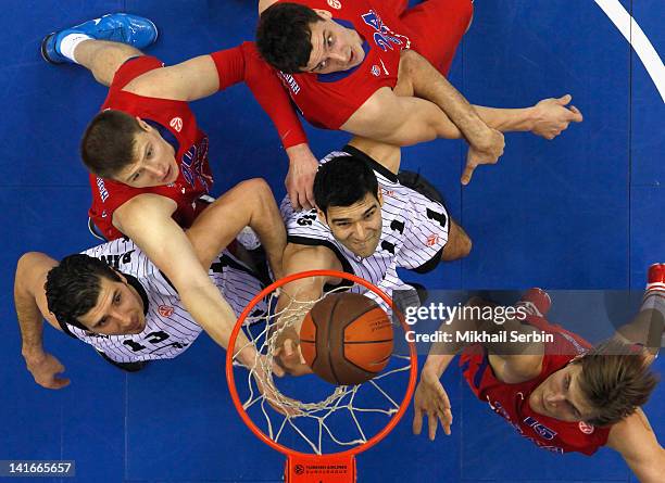 Dimitrios Mavroeidis and Marko Banic of Gescrap BB compete with Andrey Vorontsevich Alexander Kaun and Andrei Kirilenko of CSKA Moscow during the...