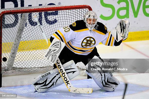 Goaltender Tim Thomas of the Boston Bruins warms up prior to the start of a NHL game against the Florida Panthers at the BankAtlantic Center on March...