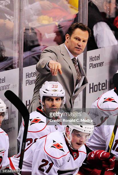 Head Coach Kirk Muller of the Carolina Hurricanes looks on during a NHL game against the Florida Panthers at the BankAtlantic Center on March 11,...