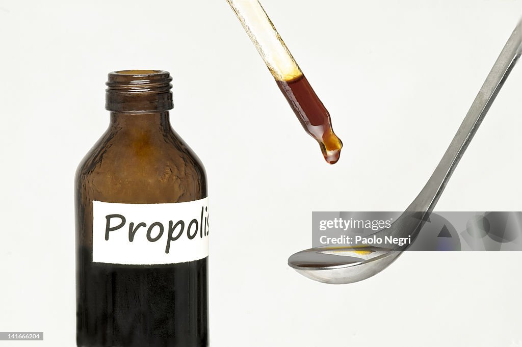 Eye dropper with tincture of propolis and spoon