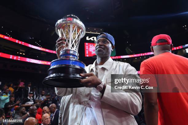 Head coach Stephen Jackson of the Trilogy celebrates with the trophy after defeating Power during the BIG3 Championship at State Farm Arena on August...