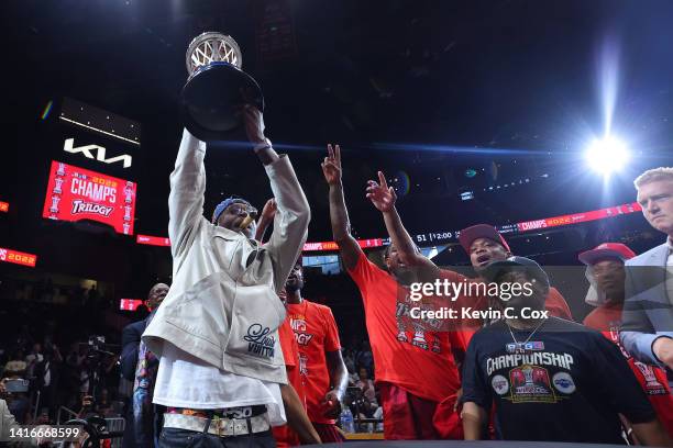 Head coach Stephen Jackson of the Trilogy celebrates with the trophy after defeating Power during the BIG3 Championship at State Farm Arena on August...