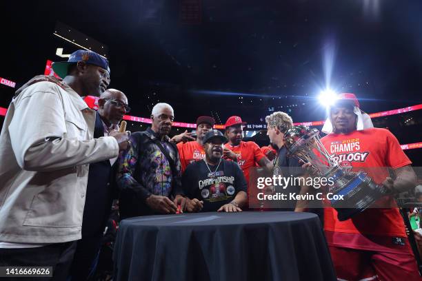 Head coach Stephen Jackson of the Trilogy, Clyde Drexler, Julius Erving, Ice Cube and the Trilogy team pose for a photo with the trophy after Trilogy...