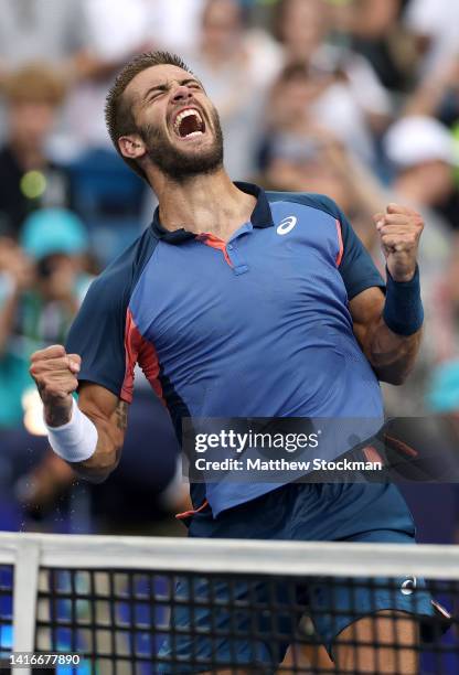 Borna Coric of Croatia celebrates after defeating Stefanos Tsitsipas of Greece in their Men's Singles Final match on day nine of the Western &...