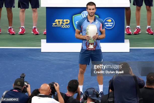 Borna Coric of Croatia celebrates after defeating Stefanos Tsitsipas of Greece in their Men's Singles Final match on day nine of the Western &...