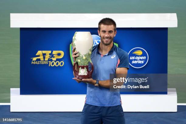 Borna Coric of Croatia celebrates after defeating Stefanos Tsitsipas of Greece in their Men's Singles Final match on day nine of the Western &...