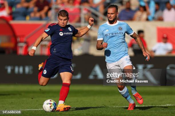 Chris Mueller of Chicago Fire takes a shot on goal against Maxime Chanot of New York City FC during the first half at SeatGeek Stadium on August 21,...