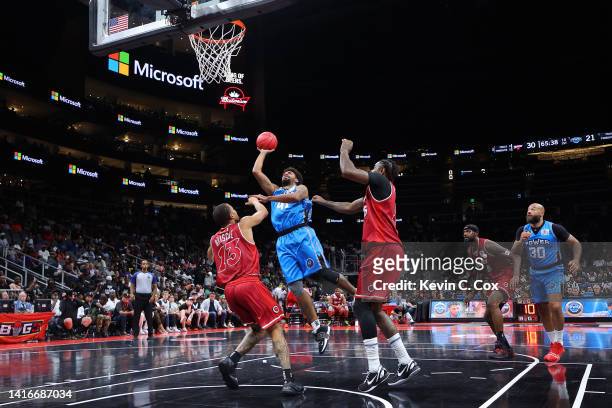 Glen Rice Jr. #41 of the Power shoots against Isaiah Briscoe of the Trilogy during the BIG3 Championship at State Farm Arena on August 21, 2022 in...