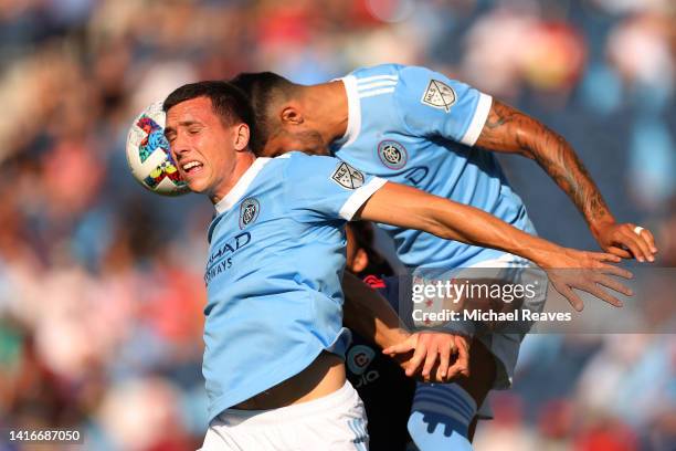 Malte Amundsen of New York City FC heads the ball against the Chicago Fire during the first half at SeatGeek Stadium on August 21, 2022 in...