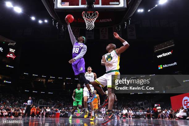 Mike Taylor of the Ghost Ballers shoots against Jodie Meeks of the Ball Hogs during the All-Star game prior to the BIG3 Championship at State Farm...