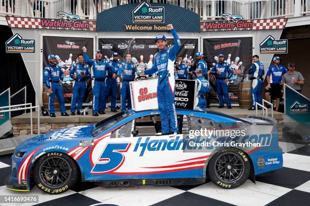 Kyle Larson, driver of the HendrickCars.com Chevrolet, celebrates in the Ruoff Mortgage victory lane after winning the NASCAR Cup Series Go Bowling...