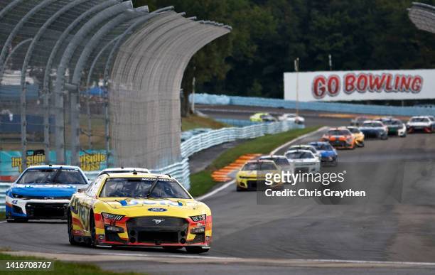 Michael McDowell, driver of the Love's Travel Stops Ford, drives during the NASCAR Cup Series Go Bowling at The Glen at Watkins Glen International on...