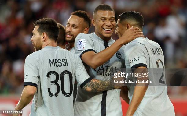 Achraf Hakimi of PSG celebrates his goal with Kylian Mbappe, Neymar Jr, Lionel Messi during the Ligue 1 Uber Eats match between Lille OSC and Paris...