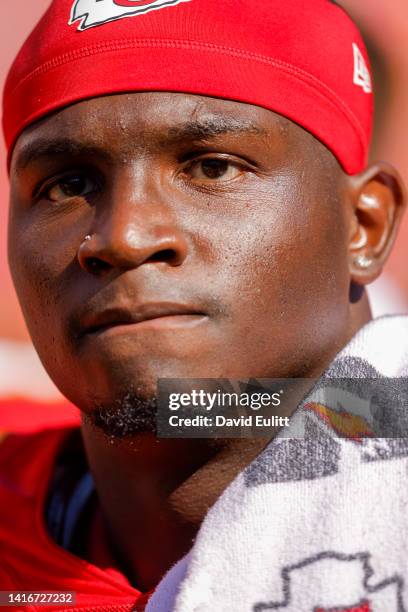 Willie Gay of the Kansas City Chiefs stands on the sideline during the second half of the preseason game against the Washington Commanders at...