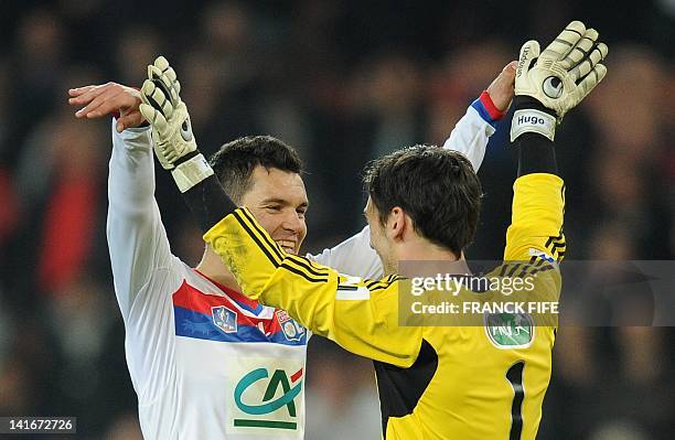 Lyon's defender Dejan Lovren and goalkeeper Hugo Lloris celebrate