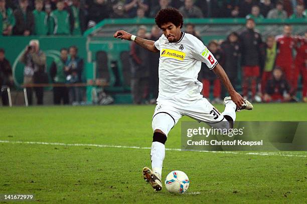 Dante of Moenchengladbach misses a penalty durign the penalty shoot-out during the DFB Cup semi final match between Borussia Moenchengladbach and FC...