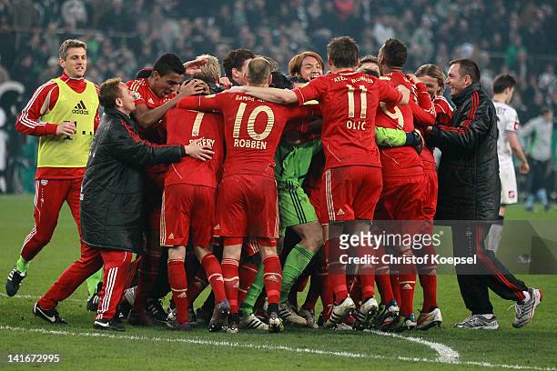 Bayern celebrates the 4-2 victory after penalty shoot-out after the DFB Cup semi final match between Borussia Moenchengladbach and FC Bayern Muenchen...