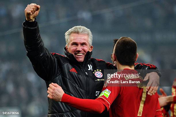 Head coach Jupp Heynckes of Muenchen celebrates with Franck Ribery after winning the DFB Cup semi final match between Borussia Moenchengladbach and...