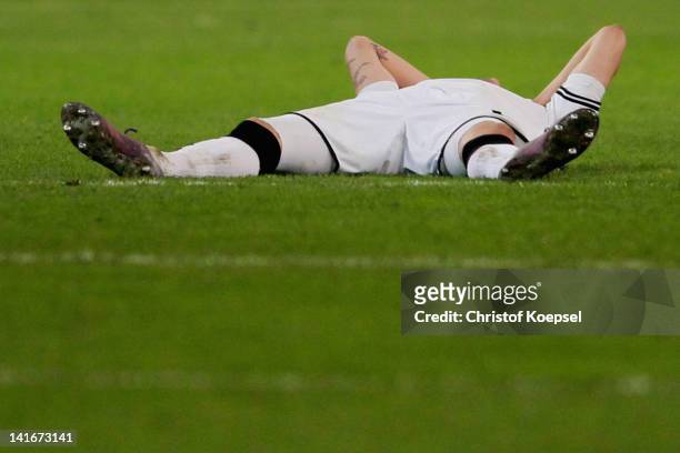 Havard Nordtveit of Moenchengladbach lies dejected on the pitch after losing 2-4 after penalty shoot-out the DFB Cup semi final match between...