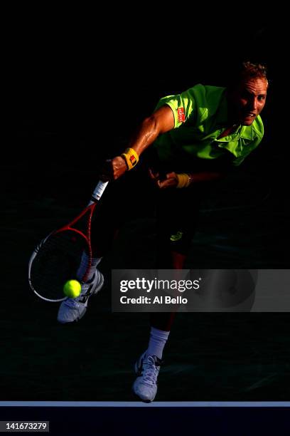 Steve Darcis of Belguim serves to David Nalbandian of Argentina during Day 3 of the Sony Ericsson Open at Crandon Park Tennis Center on March 21,...