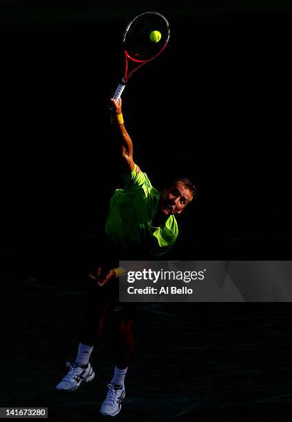 Steve Darcis of Belguim serves to David Nalbandian of Argentina during Day 3 of the Sony Ericsson Open at Crandon Park Tennis Center on March 21,...