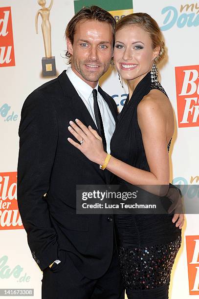 Sven Hannawald and Alena Gerber attend the 'Goldene BILD der FRAU Award' at Axel Springer Haus on March 21, 2012 in Berlin, Germany.