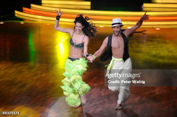 Rebecca Mir and Massimo Sinato performs during the 'Let's Dance' TV Show on March 21, 2012 in Cologne, Germany.